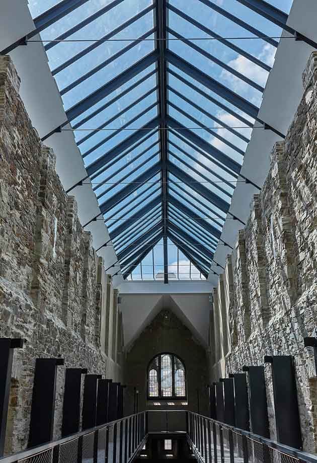 VELUX Glazing Panels dual pitched solution with hip end above historic wing of Bodmin Jail Hotel
