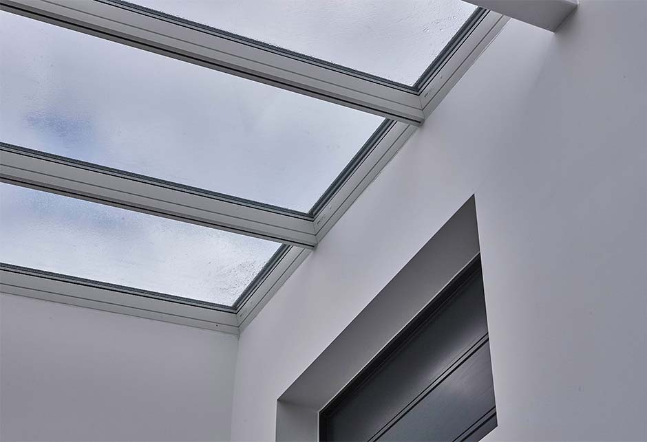 Interior Image, close-up of where modular skylight joins building.