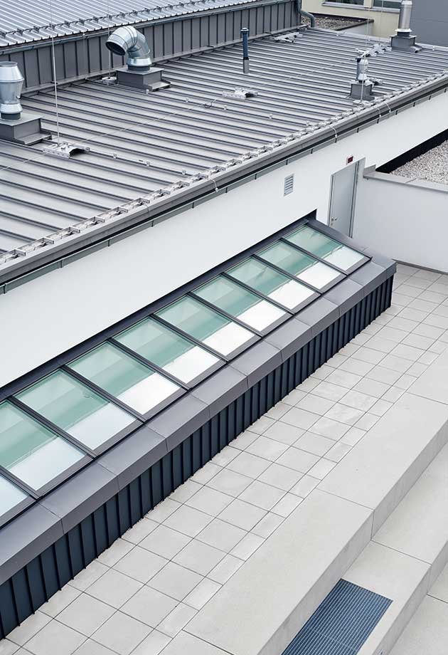 Roof view of VELUX skylight solution with Longlight 5°-30°, new school building Ebensee, Austria