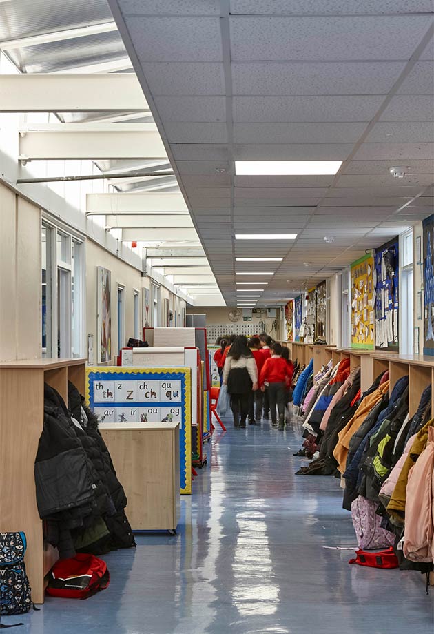 Students in a bright corridor