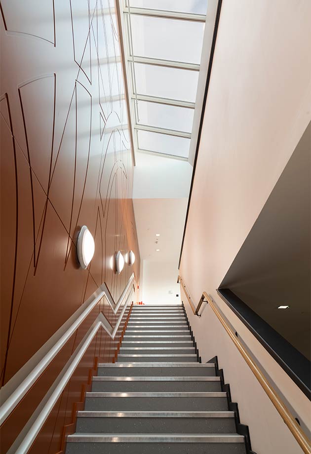 VELUX Wall-mounted Longlight solution above main circulation staircase to maximise daylight